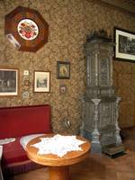 Ofen im historischen Salon des Schraube - Museums, eigens für diesen Raum konzipiert und in der Ilsenburger Hütte angefertigt 80er Jahre 19. Jahrhundert