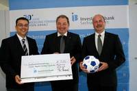 Investitionsbank übergibt Spendenscheck an Kinderheim