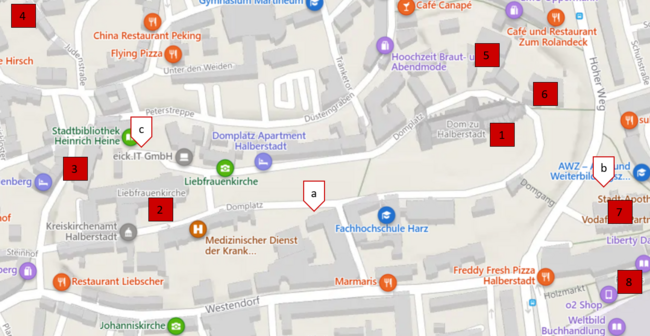 Stadtplan mit einer Legende mit Zahlen für die Sehenswürdigkeiten und Buchstaben für die Behindertenparkplätze