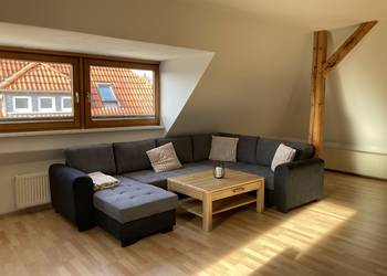 Wohnzimmer mit gemütlicher Sitzecke [(c): Tourist Information Halberstadt]